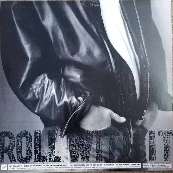 Steve Winwood - Roll With It